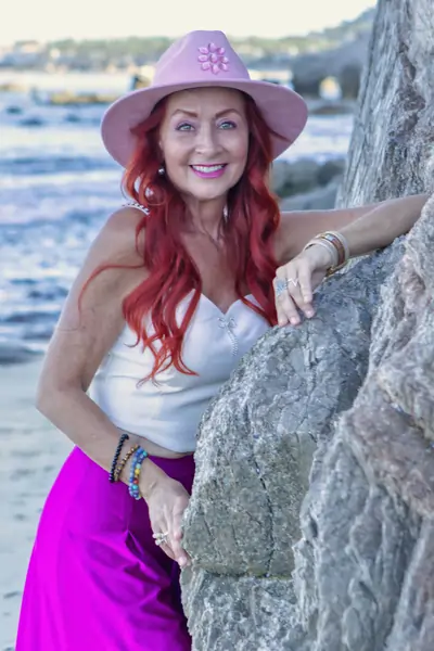 EVY ROMEIKE